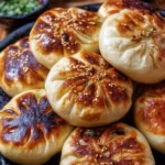 Pan-fried veggie buns with a crispy exterior and flavorful vegetable filling