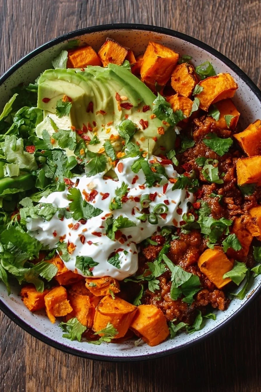 Delicious Sweet Potato Taco Bowl topped with fresh ingredients