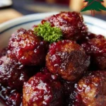 Festive Christmas Cranberry Meatballs served on a platter.