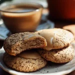 Deliciously baked espresso cookies topped with coffee grounds and chocolate chips