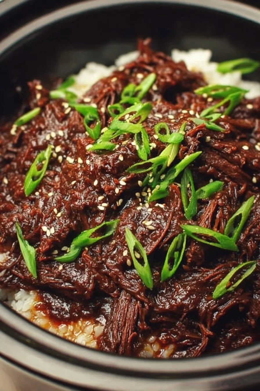 Delicious slow cooker Korean beef served over rice with vegetables
